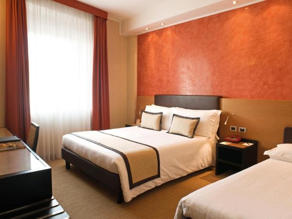 Hotel San Pietro : photo 1 de la chambre chambre triple supérieure