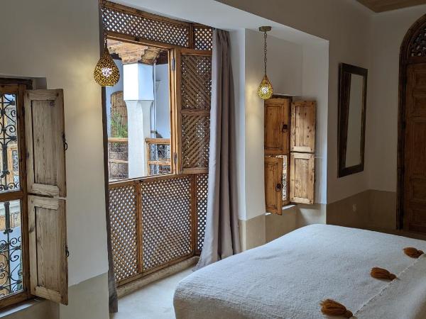 Riad Dar Eternity : photo 2 de la chambre chambre double ou lits jumeaux deluxe - vue sur piscine