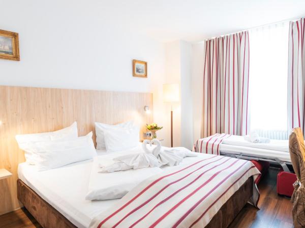 Hotel Astoria Stuttgart City : photo 6 de la chambre chambre triple