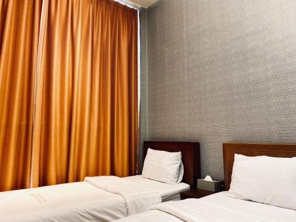 Myeongdong Merlin Hotel : photo 1 de la chambre chambre lits jumeaux deluxe