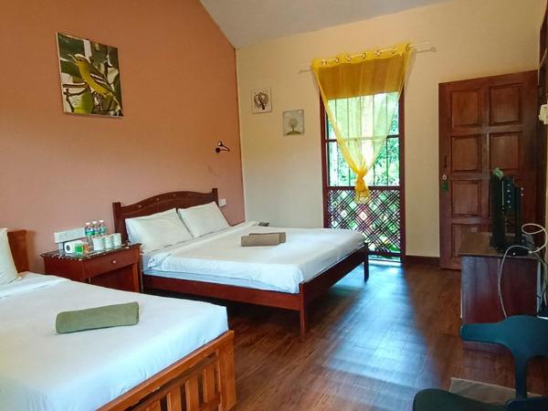 Tanjung Inn : photo 2 de la chambre chambre familiale deluxe