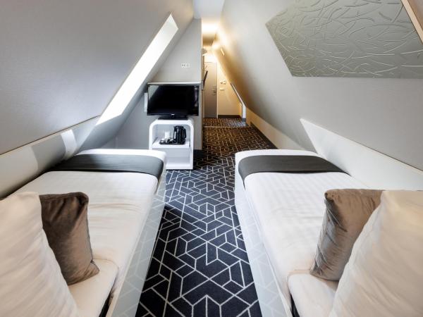 Hotel CC : photo 5 de la chambre chambre lits jumeaux mansardée