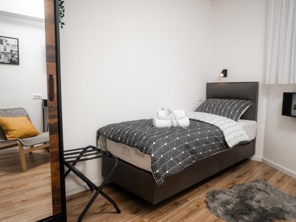 LaRoom - Free Parking : photo 4 de la chambre chambre simple avec salle de bains privative