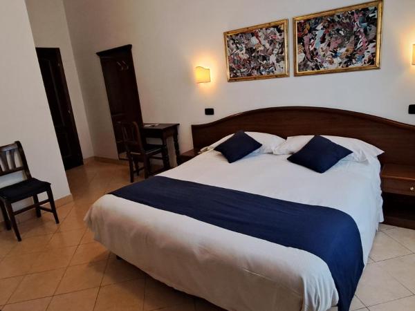 Hotel Bonazzi : photo 4 de la chambre chambre triple