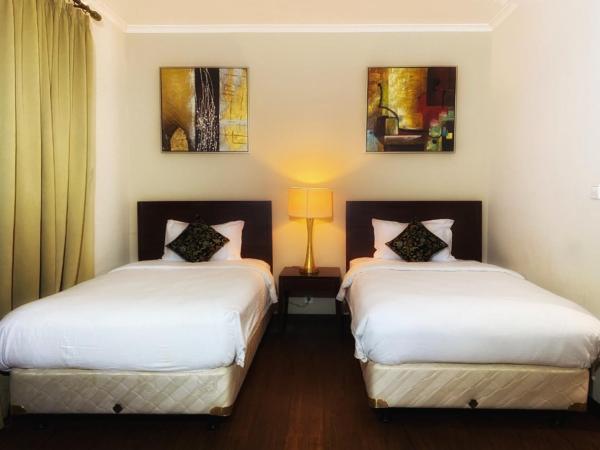 Ancol Marina Residence : photo 4 de la chambre chambre lits jumeaux deluxe