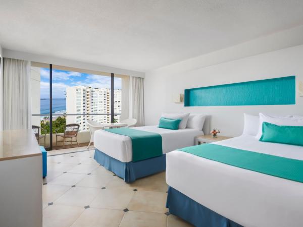 Sunscape Dorado Pacifico Ixtapa Resort & Spa- All Inclusive : photo 3 de la chambre chambre de luxe avec vue partielle sur l'océan