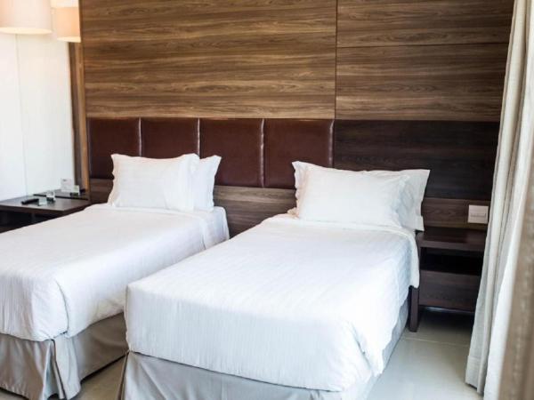 Américas Barra Hotel : photo 1 de la chambre chambre lits jumeaux avec balcon