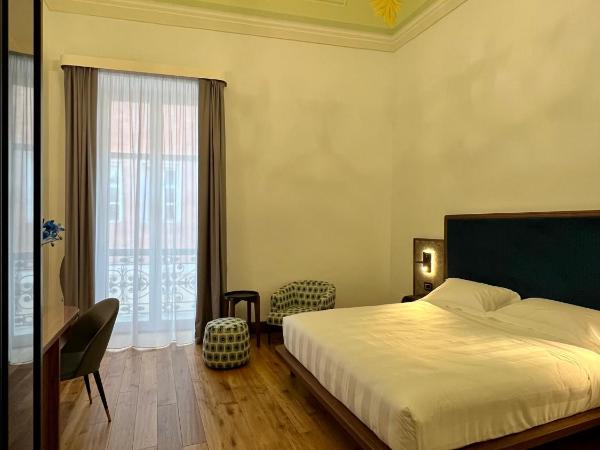 Lo Stemma Luxury Boutique Hotel : photo 1 de la chambre chambre lit king-size avec balcon