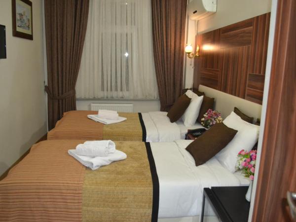 Grand Fatih Hotel : photo 2 de la chambre chambre quadruple standard