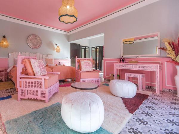 Maison Daouia : photo 2 de la chambre chambre triple - vue sur jardin