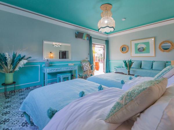 Maison Daouia : photo 2 de la chambre chambre triple - vue sur la piscine