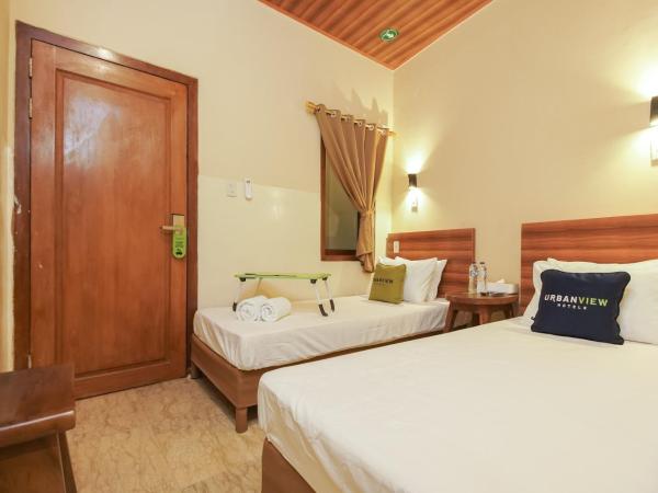 Urbanview Hotel Cantee Halim Perdanakusuma by RedDoorz : photo 4 de la chambre chambre lits jumeaux supérieure