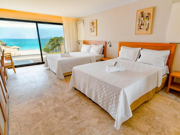 Buzios Espiritualidade Hotel : photo 1 de la chambre chambre quadruple - vue sur mer