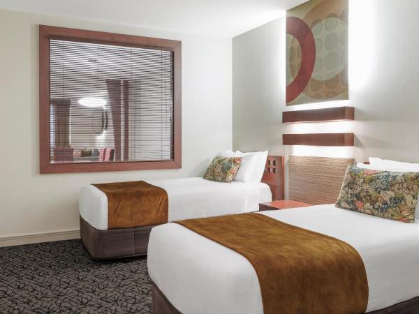 CityLife Wellington : photo 2 de la chambre suite 2 chambres directors avec 1 lit queen-size et 2 lits simples