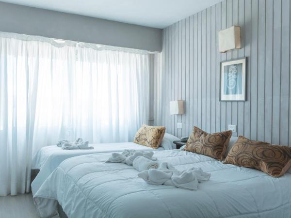 Tangoinn Club Hotel : photo 2 de la chambre chambre triple - vue sur lac