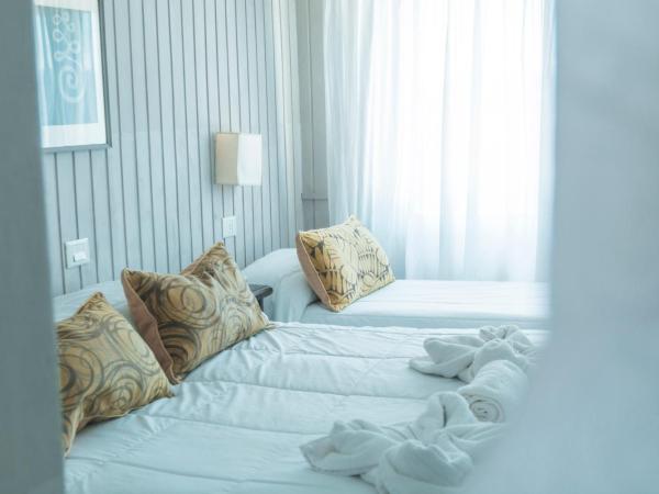 Tangoinn Club Hotel : photo 1 de la chambre chambre triple - vue sur lac