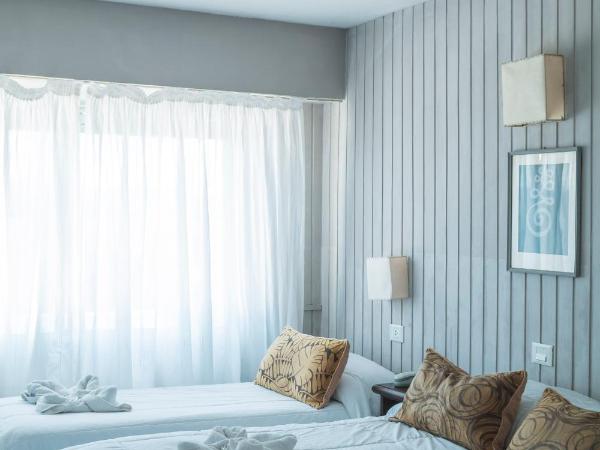 Tangoinn Club Hotel : photo 7 de la chambre chambre triple - vue sur lac