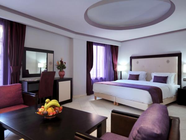 Blue Sea Le Printemps : photo 9 de la chambre suite familiale avec balcon