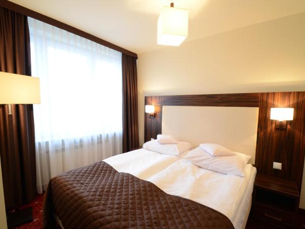 Hotel PZMot : photo 4 de la chambre studio lit king-size avec canapé-lit