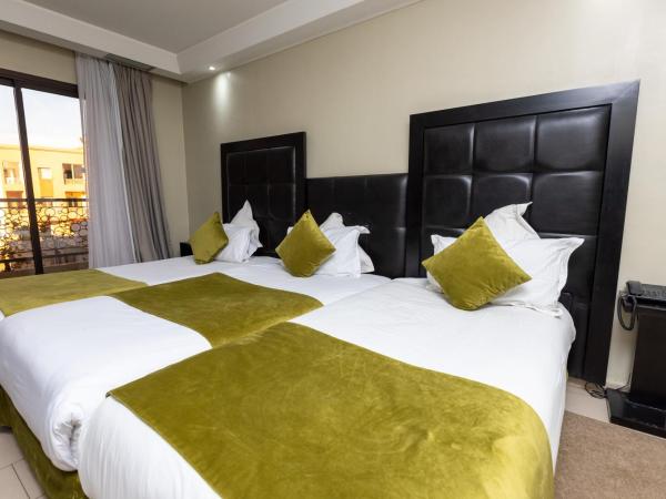Tempoo Hotel Marrakech City Centre Adults Only : photo 1 de la chambre chambre triple deluxe