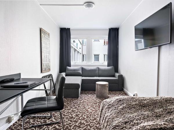 Sure Hotel by Best Western Algen : photo 2 de la chambre chambre simple avec canapé-lit