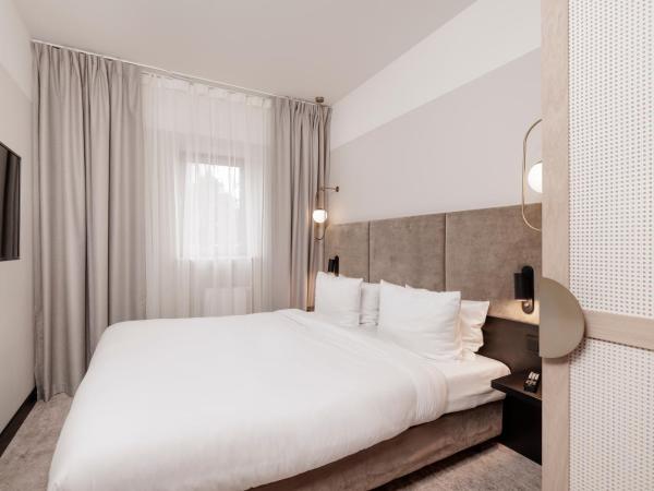 Royal Tulip Sand Kolobrzeg : photo 4 de la chambre suite exécutive 2 chambres avec 2 lits king-size