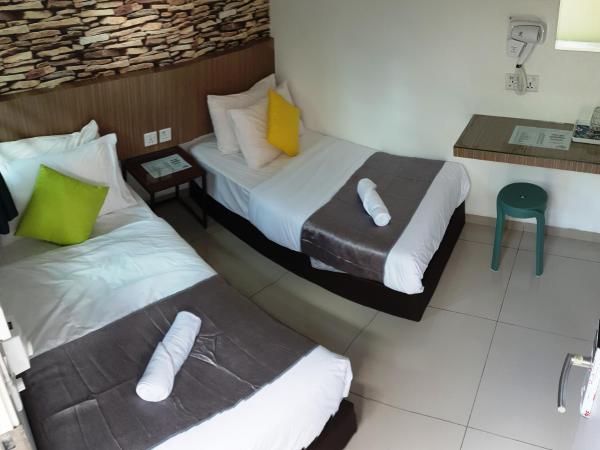 Garden 96 inn : photo 2 de la chambre chambre lits jumeaux standard