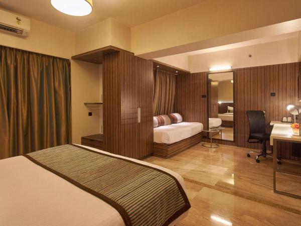 Residency Sarovar Portico : photo 6 de la chambre deluxe room 1 double bed 
