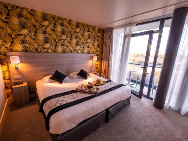 Brit Hotel Eden SPA Honfleur : photo 1 de la chambre chambre double deluxe