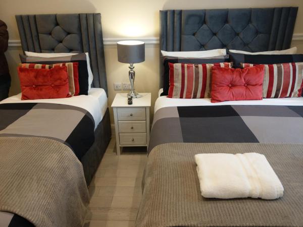 Prime Inn : photo 4 de la chambre chambre triple