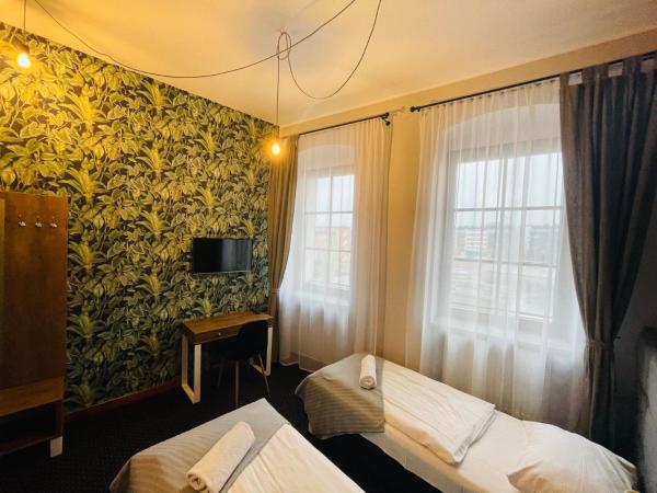 Boogie ApartHouse Old Town : photo 5 de la chambre chambre double ou lits jumeaux avec salle de bains privative