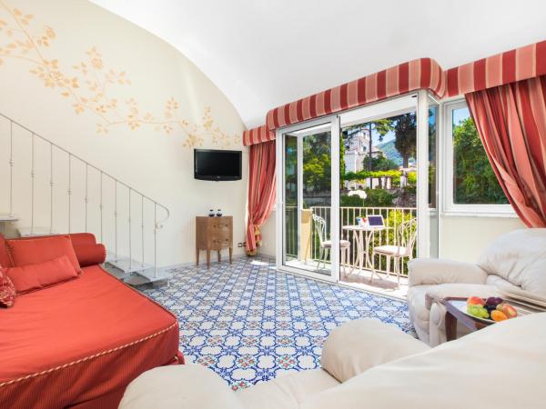 Hotel Antiche Mura : photo 4 de la chambre suite lit king-size avec baignoire spa