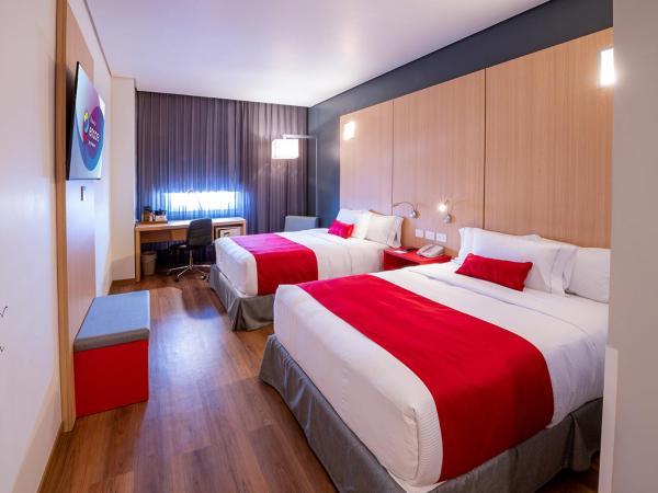 Ramada Encore by Wyndham Guadalajara Aeropuerto : photo 2 de la chambre chambre double avec 2 lits doubles - non-fumeurs