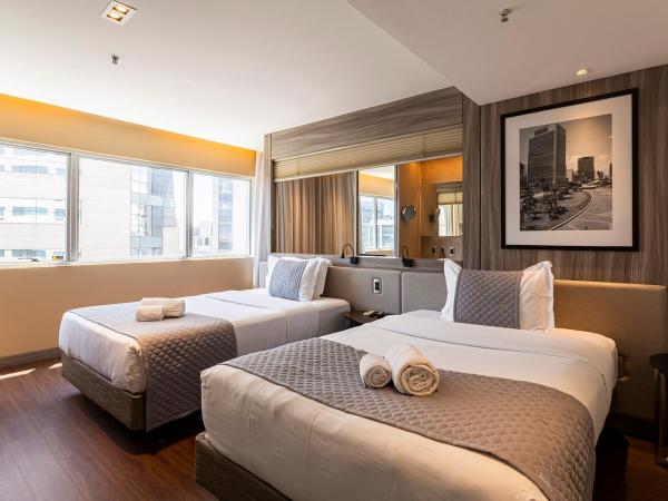 You Stay at Vila Olimpia - ITC : photo 4 de la chambre chambre lit king-size deluxe