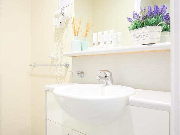 Arrow on Swanston : photo 10 de la chambre hébergement triple avec lits simples