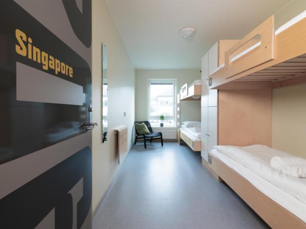 Rumi Hostel : photo 1 de la chambre chambre quadruple avec salle de bains commune