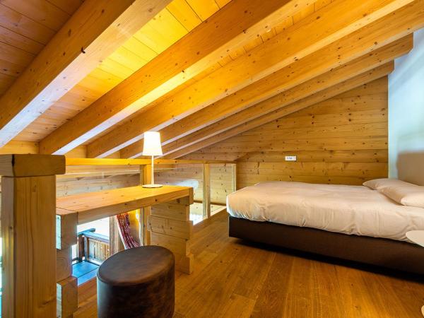 Nendaz 4 Vallées & SPA 4* Superior : photo 7 de la chambre chambre en mezzanine avec vue