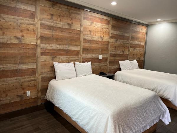 The Symphony Inn & Suites : photo 3 de la chambre chambre lit queen-size