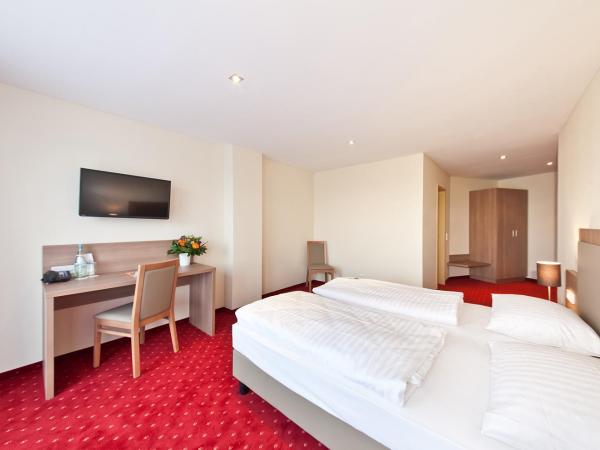 Hotel Excelsior Dortmund Hauptbahnhof : photo 1 de la chambre chambre double ou lits jumeaux confort