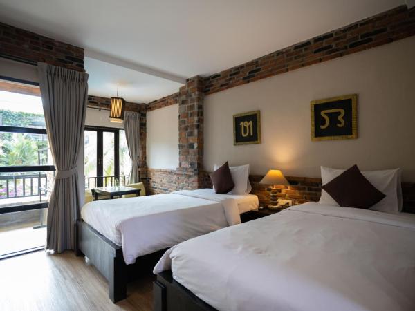 Motive Cottage Resort : photo 8 de la chambre chambre lits jumeaux deluxe
