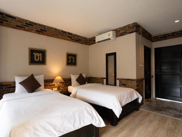 Motive Cottage Resort : photo 5 de la chambre chambre lits jumeaux deluxe