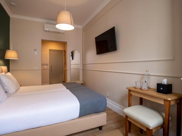 Rossio FLH Suites : photo 5 de la chambre chambre lits jumeaux