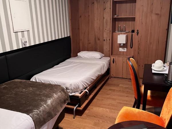 Logis Hôtel Ettenheim : photo 1 de la chambre chambre lits jumeaux