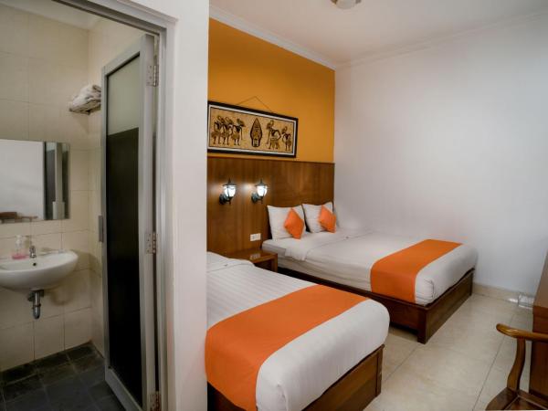 Hotel Poncowinatan - Tugu : photo 2 de la chambre suite familiale