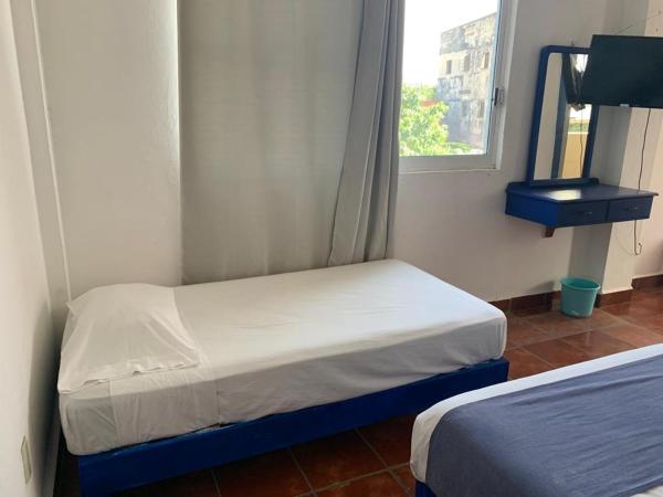 Hotel & Hostal Mayflower : photo 2 de la chambre chambre triple basique