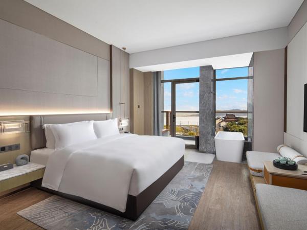 Wonderland Hotel Ningbo International Conference Center : photo 1 de la chambre chambre lit king-size deluxe - vue sur lac