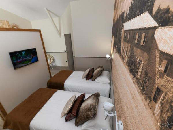Les Chambres d'Aurore : photo 3 de la chambre chambre double ou lits jumeaux - accessible aux personnes à mobilité réduite