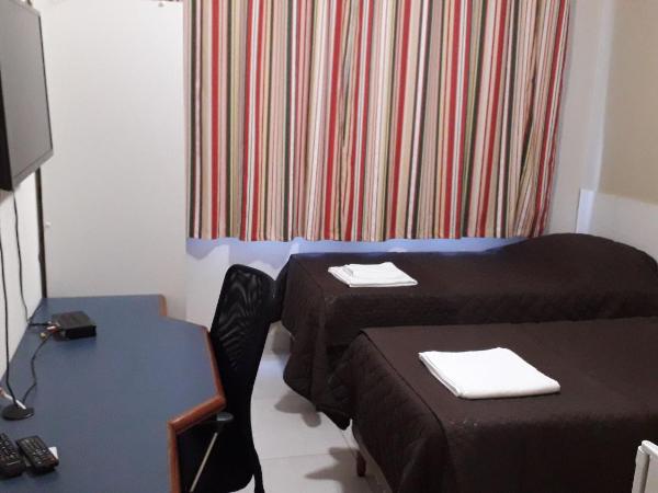 BH EXPO SUITES & KITNETES : photo 3 de la chambre chambre lits jumeaux avec salle de bains privative