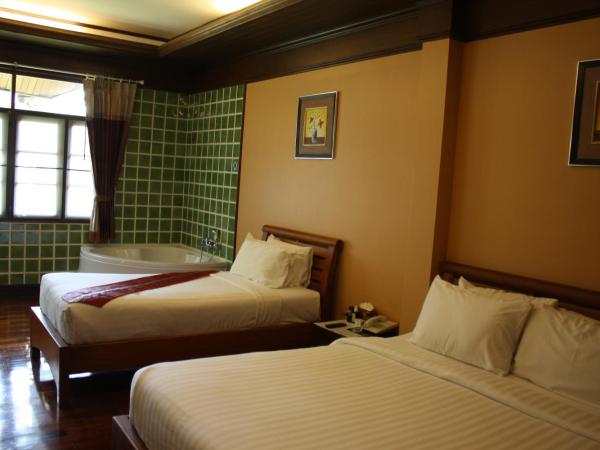 The Aiyapura Koh Chang : photo 4 de la chambre chambre double ou lits jumeaux supérieure - vue sur jardin