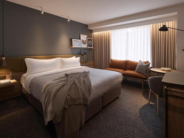 Rydges Melbourne : photo 1 de la chambre chambre lit king-size